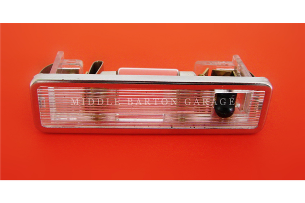 LIGHT COURTESY 124 1966-83 UNDER RADIO